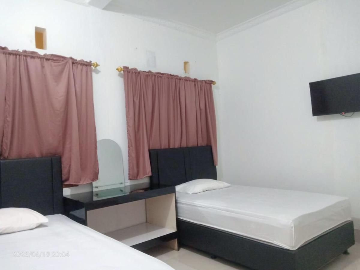 Permata Homestay Kotamobagu Mitra Reddoorz מראה חיצוני תמונה
